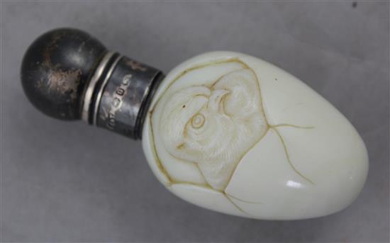 A Stourbridge milk glass chick and egg scent bottle, possibly Stevens & Williams, late 19th century, 8.5cm